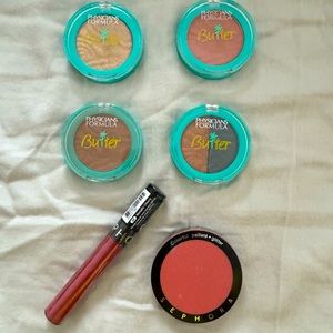 Unopened makeup items with tape on it